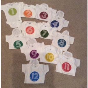 Set of monthly onesies